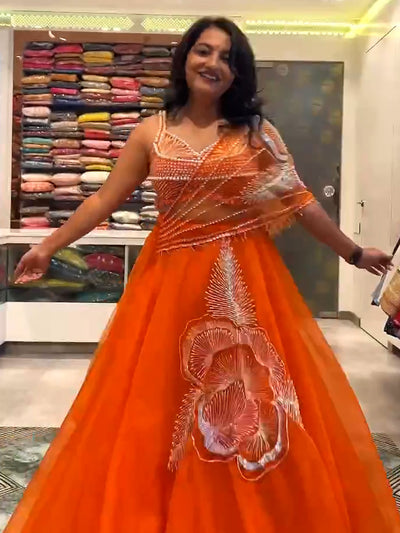 Malavika B Swamy's orange lehenga
