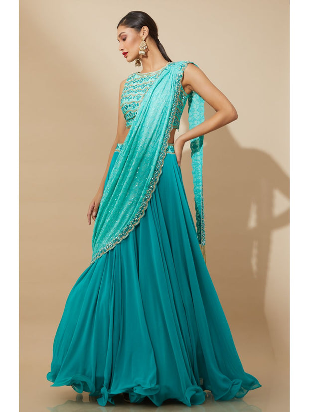 Turquoise mirrorwork and embroidered lehenga choli